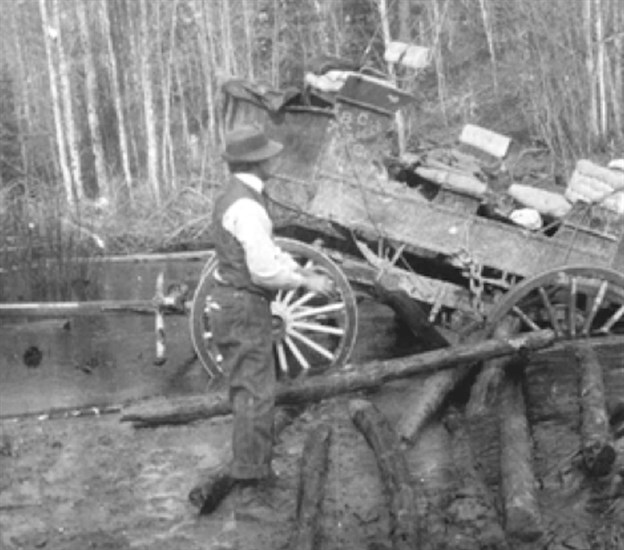 This wagon slipped off the early corduroy road that was the first leg of the Hope Princeton Highway in 1860-61.
