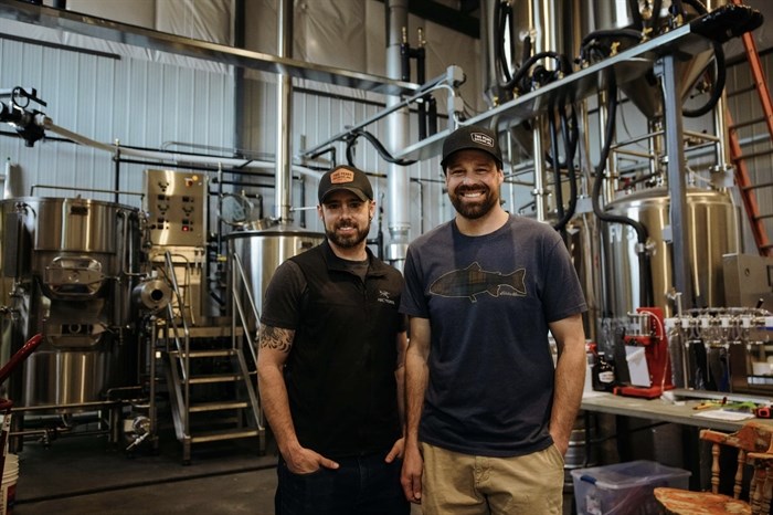 Nick Markowsky, left, and Brandon Highton, owners of Two Peaks Brewing in Kitimat, B.C.