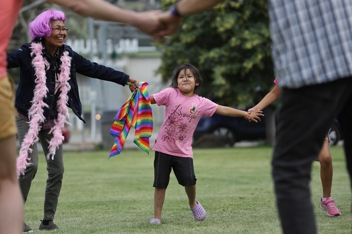 LSIB Youth Serenity Marsden, centre, participates in a round dance during the Lower Similkameen Indian Band’s third annual Pride carnival in Keremeos on June 16, 2023.
