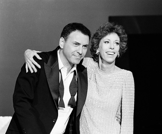 FILE - Comedian Carol Burnett and actor Alan Arkin appear during the filming of a special 