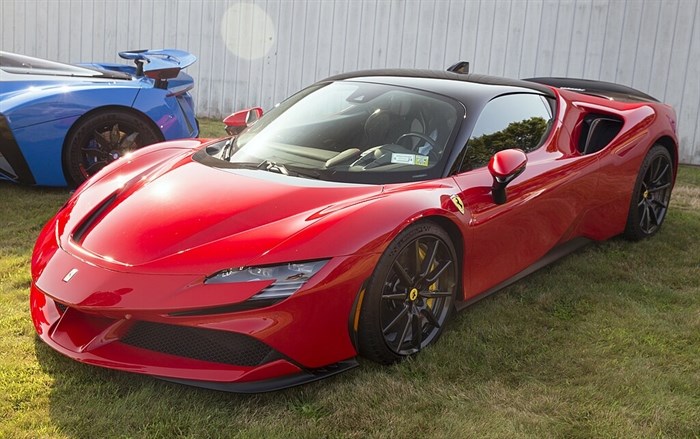 FILE PHOTO - A Ferrari SF90 Stradale is displayed at a Cars and Coffee event in Bridgehampton, New York, Sept. 18, 2022.