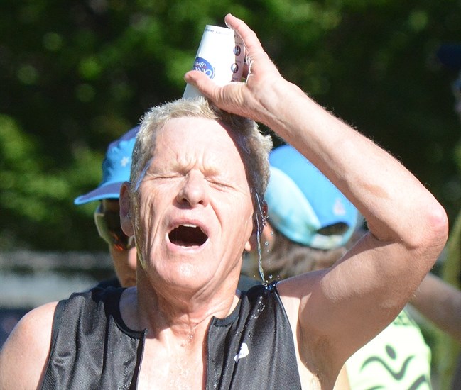 Dean Gahan of North Vancouver enjoys some cold water during transition. He finished second in the 65-69 category.