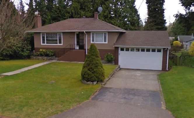 Two people were awarded a year's worth of rent after a new buyer evicted them from their Coquitlam home (shown in this 2009 image). It was demolished later that year.