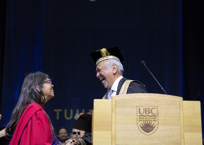 suiki?st (Pauline Terbasket) receiving her honorary degree from UBC Chancellor Steven Point, at the UBC Okanagan graduation ceremony on July 8, 2023.