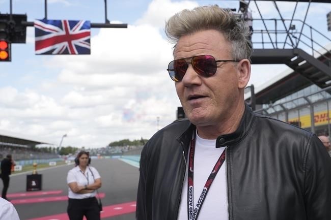 Celebrity chef Gordon Ramsay is bringing his burger and steak outlets to a B.C. casino and resort. Ramsay walks through the grid before the British Formula One Grand Prix race at the Silverstone racetrack, Silverstone, England, Sunday, July 9, 2023. 