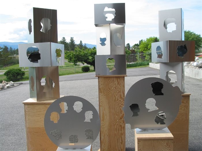 A selection of free standing artworks of brushed stainless steel with mirror finished details by Kelowna artist Geert Maas. 