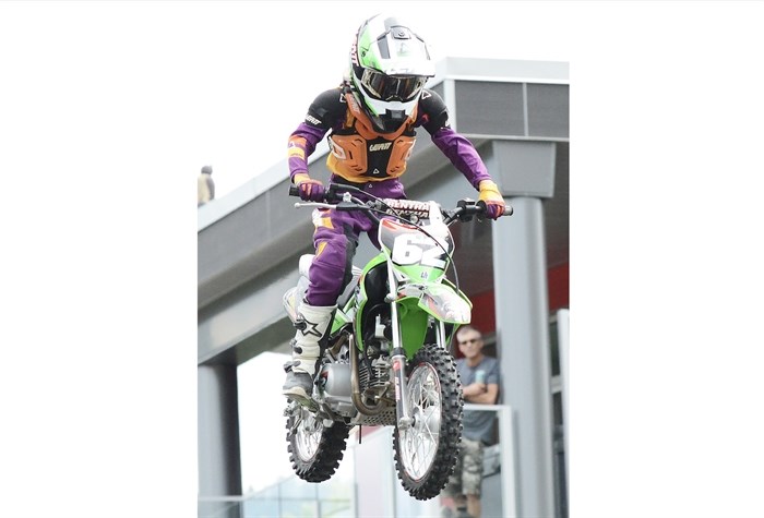 Kruz Garwasiuk, 9, was riding with the big boys at the GlobalFMX mega motocross show.