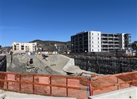 Hadgraft Wilson Place is visible on the right side of the photo next to UBCO&#39;s downtown construction site.