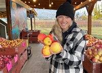 Jennay Oliver showing her locally sourced apples. 