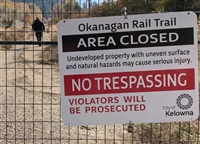 FILE PHOTO - A fence on the Kelowna side of the Okanagan Rail Trail has a sign warning users the section heading to Lake Country is closed.