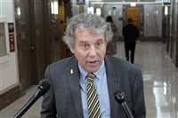 Sen. Sherrod Brown, D-Ohio, talks with reporters before a Senate Banking Committee hearing, Thursday, June 22, 2023, on Capitol Hill in Washington. Canadian cannabis companies are cheering a Senate committee’s decision today to push forward with easing federal financing restrictions on the U.S. industry.
