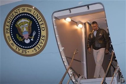 President Barack Obama steps off Air Force One after arriving at Bagram Air Field for an unannounced visit, on Sunday, May 25, 2014, north of Kabul, Afghanistan.