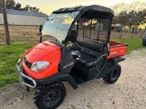 One of the stolen vehicles; a red 2011 Kubota 500 RTV.