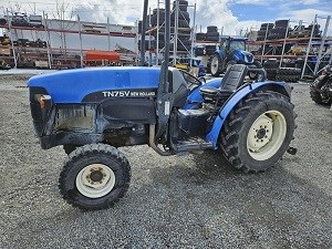 One of the stolen tractors a blue New Holland tractor, older style.