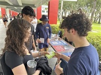 College students pass out Plan B to educate young voters at Florida Atlantic University on Thursday, April 11, 2024, in Boca Raton, Fla. Abortion and marijuana will be on Florida&#39;s November ballot, and these issues are critical issues for young voters.