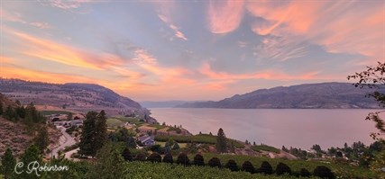 Summerland is pink and purple during an evening sunset. 