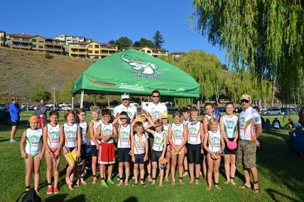 Coaches and kids from Ogopogo Triathlon Club getting ready for participation in a race. 