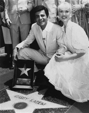 In this April 27, 1981 file photo, Casey Kasem and his wife Jean smile as he receives his own 