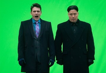 Actor James Franco, left, yawns before filming a scene with an actor playing North Korean leader Kim Jong Un for the movie 