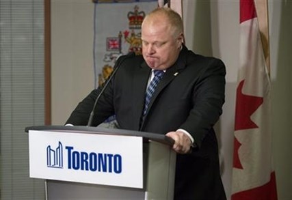 Mayor Rob Ford holds back his emotions while speaking during an invite-only press conference at City Hall in Toronto after his stay in a rehabilitation facility, on Monday June 30, 2014.