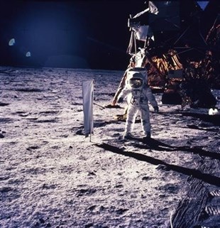 In this July 20, 1969 file photo provided by NASA, astronaut Edwin E. Aldrin Jr. walks on the surface of the moon.