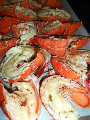 Two boxes of damaged Atlantic lobster still made for a delicious meal at the Kelowna Gospel Mission, Aug. 21, 2014.