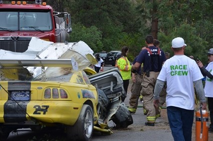 Two fire trucks were on scene at the Knox Mountain accident to put out the smoke smoldering from the Ford Mustang GTO. 