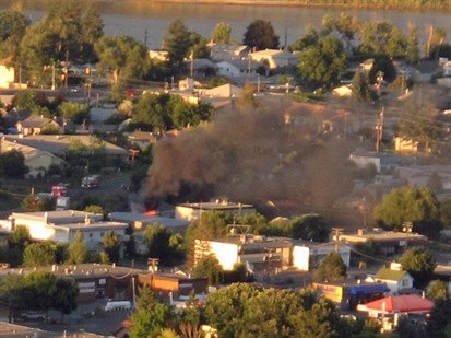 A fire Aug. 2, 2012 destroys part of the Kamloops Food Bank building.