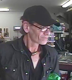 The suspect in the Eastside Grocery armed robbery is pictured in this image from the RCMP.