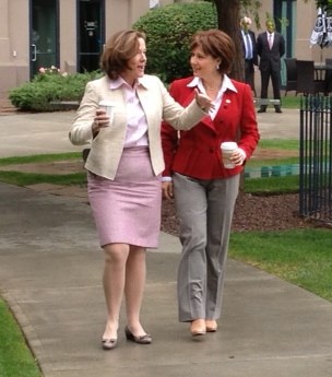 B.C. Premier Christy Clark and Alison Redford, premier of Alberta, take a ten minute stroll along the boardwalk near the Delta Grand Hotel before their scheduled 11:30 conference.