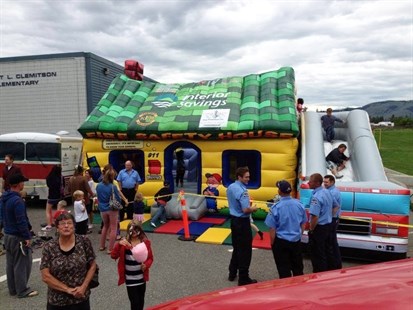 The new inflatable fire safety house helps local fire fighters teach fire safety to students.