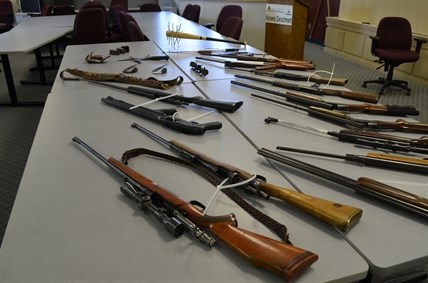 An assortment of weapons seized by the Kelowna RCMP at a home in Glenmore.