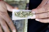 FILE PHOTO - In this Nov. 9, 2016 file photo, a marijuana joint is rolled in San Francisco.