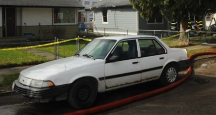 Michael Madsen was associated to this 1993 white Chevy Cavalier.