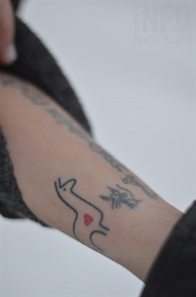 Jeeves' llama tattoo. 