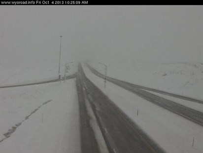 Traffic cam image from I-90 in Wyoming. Midwest storms bring heavy snow to the midwest.