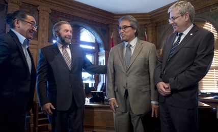 NDP MPs Charlie Angus (right), Romeo Saganash (left) and Official Opposition Leader Tom Mulcair meet with Special UN Rapporteur James Anaya to discuss his findings about issues facing First Nations in Canada, Tuesday October 8, 2013 on Parliament Hill in Ottawa.