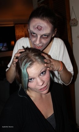 A zombified-Tori Giesbrecht poses with her friend and creator Penticton make-up artist Sheila Killins, 21.