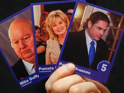 Mike Duffy, Pamela Wallin and Patrick Brazeau are among the senators featured on trading cards handed out by the federal NDP.