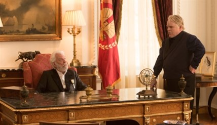 President Snow is played by Donald Sutherland (left) and Plutarch Heavensbee is played by Philip Seymour Hoffman in 