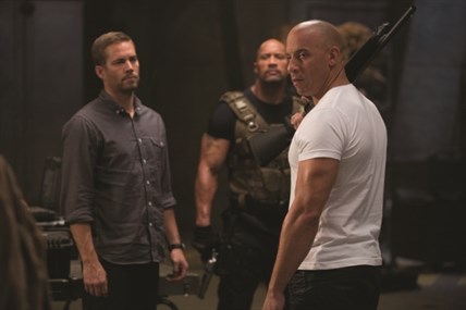 Paul Walker (left), Dwayne Johnson and Vin Diesel in Fast and Furious 6.