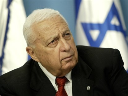 In this Sunday May 16, 2004 file photo, Israeli Prime Minister Ariel Sharon pauses during a news conference in his Jerusalem office regarding education reform.