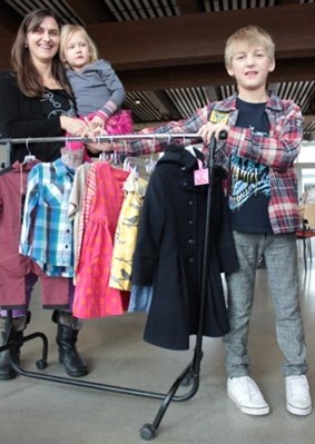 Janet Skolka, her daughter Jersey and her son Ryder, show off some of the high-end children's clothing that she sells at a discount price through her online business, at www.JillyBoBilly.com. The three were at a Dragons' Den audition earlier today in Penticton.