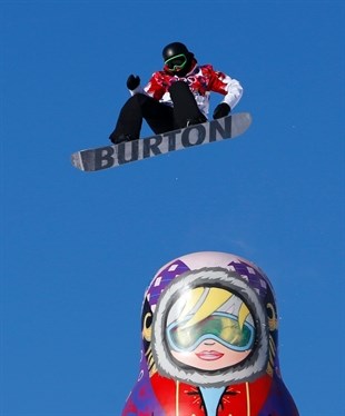 Canada's Mark McMorris takes a jump during the men's snowboard slopestyle semifinal at the Rosa Khutor Extreme Park, at the 2014 Winter Olympics in Krasnaya Polyana, Russia, Saturday, Feb. 8, 2014.