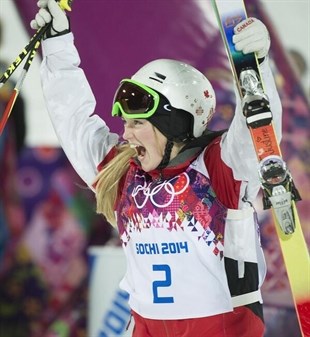 Justine Dufour-Lapointe celebrates her gold medal.