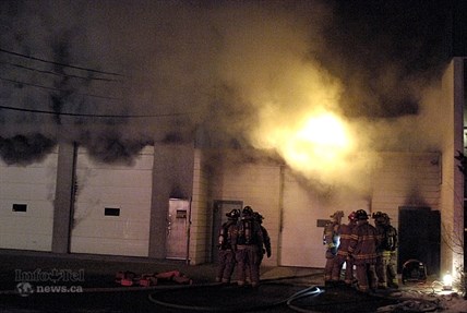Firefighters were called to Northern Lite Manufacturing Ltd. at 322 Totem Ave. on Wednesday, Feb. 26, 2014 and found heavy smoke. They hit it hard with up to 40 firefighters but once the blaze got to the roof, its collapse was inevitable.