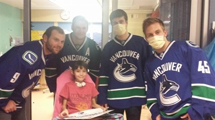 Members of the Vancouver Canucks visited nine year old Livia Coles-Frank at B.C. Children's Hospital earlier this month.