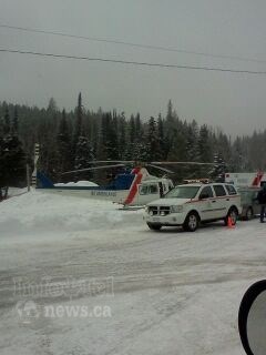 The B.C. Ambulance Service air ambulance landed in the parking lot at Crystal Mountain Resort to transport a patient in critical condition to Kelowna General Hospital on Saturday, Mar. 1, 2014.
