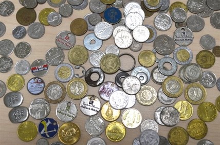 Coins from around the world, as well as washers, slugs, and tokens, are found in the city's parking meters. 