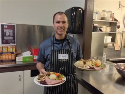 Kelowna-Lake Country MLA Norm Letnick helps serve up Easter dinner to about 700 people on Saturday, April 19, 2014.